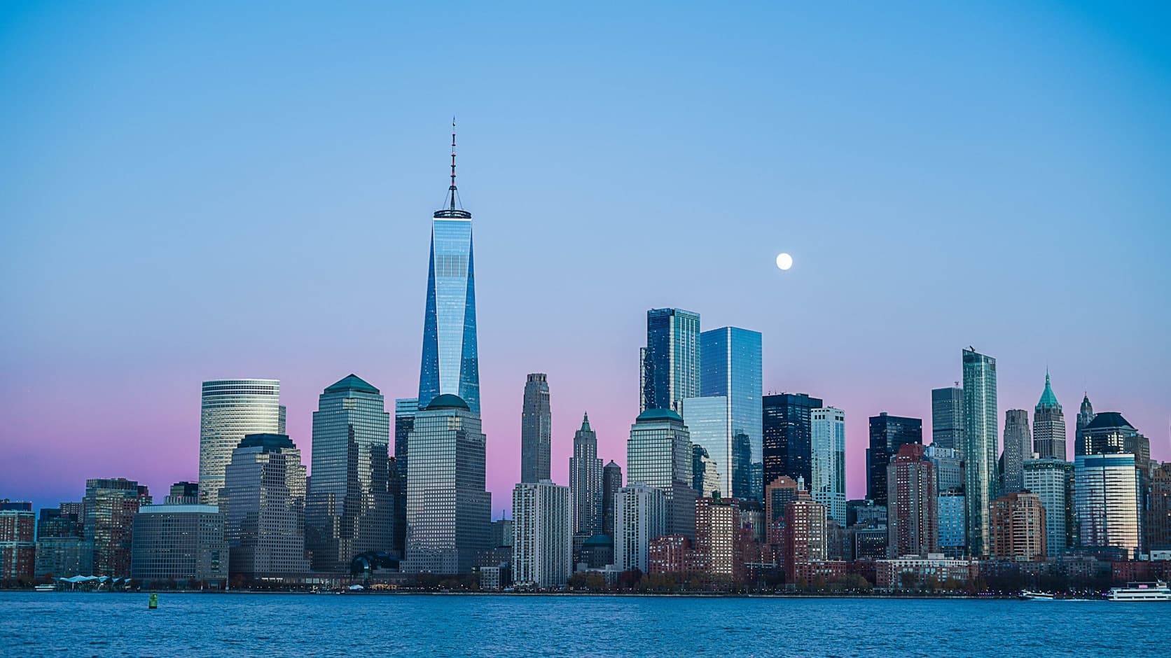 City skyline at dusk representing evening executive return journeys