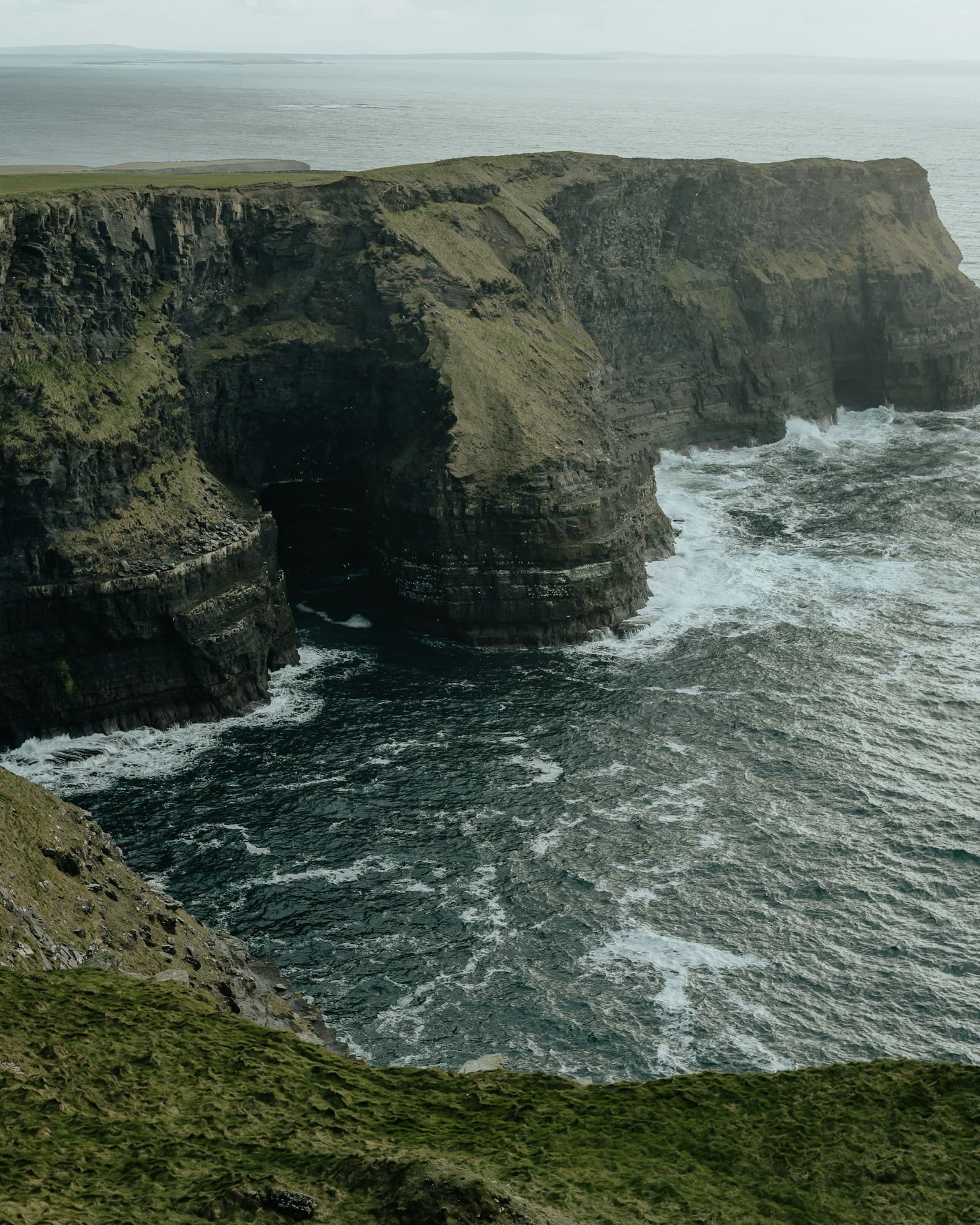 Cliffs of Moher rising from the Atlantic, County Clare, Ireland