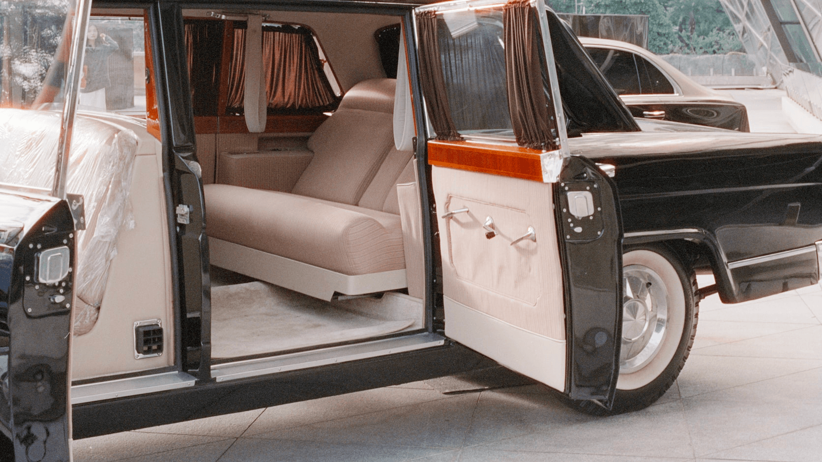 Luxury wedding limousine with doors open for guest arrival