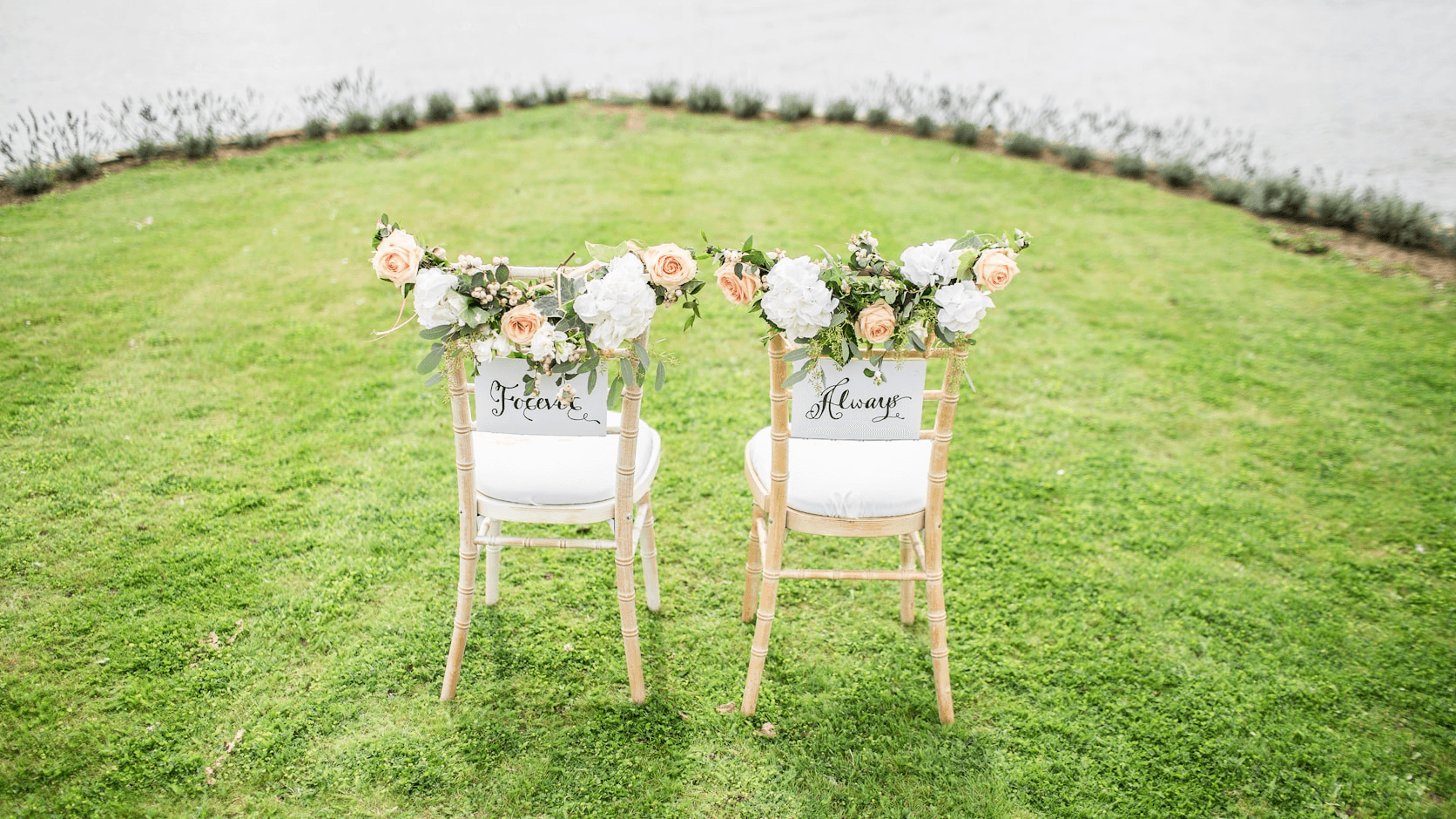 Scenic waterfront wedding ceremony setting in daylight